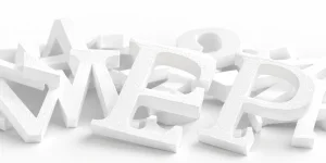 Illustration de lettres blanches en polystyrène découpées en volume